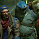 Four Suicide Squad members look forward in confusion.